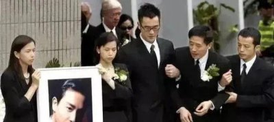 ​张国荣去世，唐鹤德把他的遗产一半留给自己，一半留给张国荣家人